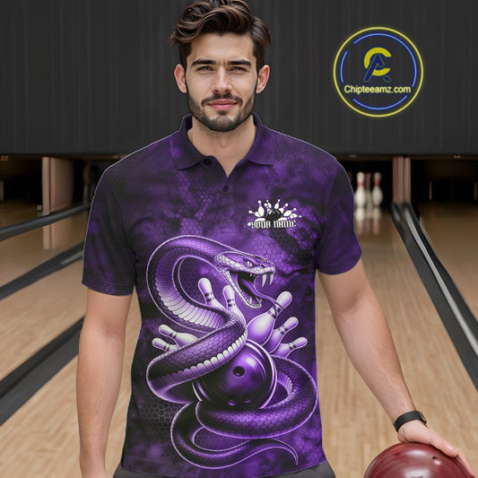 Male model wearing a bowling polo at the bowling lane with purple cobra artwork wrapped around a bowling ball.