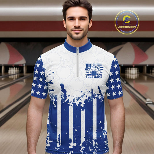 Male model wearing a custom blue and white stars and stripes patriotic men's bowling quarter-zip jersey at a bowling alley lane.