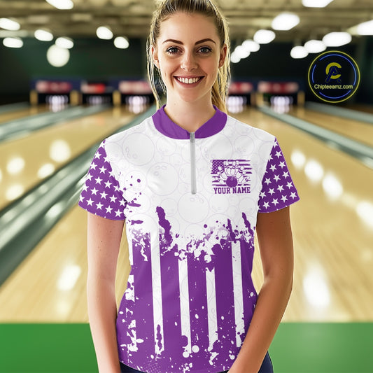 Female bowler posing on a lane wearing a personalized purple US flag performance bowling team shirt.