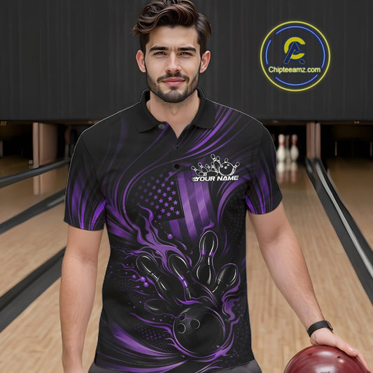 Male model wearing a black and purple bowling polo shirt at a bowling lane with fiery bowling strike graphics and patriotic styling.