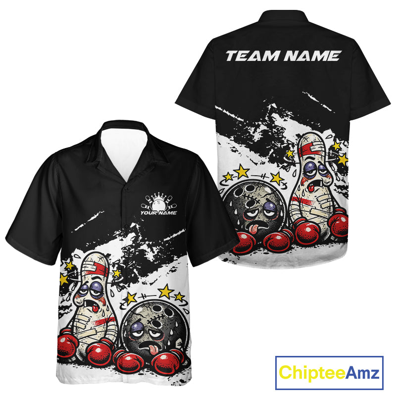 Front and back view of a button-up bowling shirt mockup in black and white, featuring cartoon boxing bowling ball and pin illustrated as beaten-up fighters.