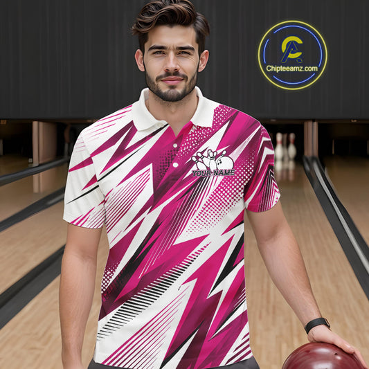 Man wearing a pink and white bowling shirt with a bowling alley in the background