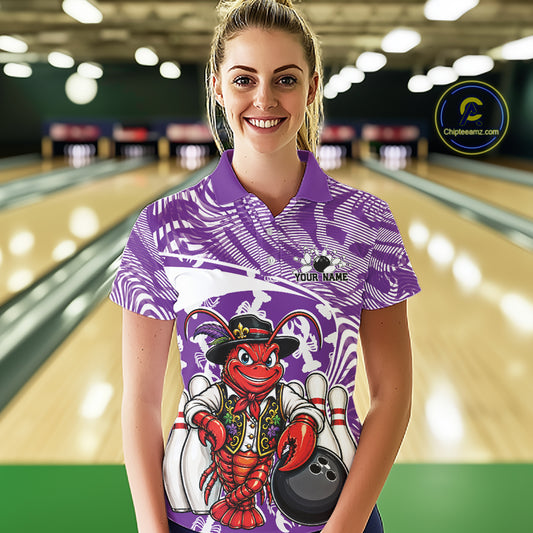 Front view of a female model in a bowling alley wearing a purple custom bowling polo shirt with a funny Cajun crawfish leaning on a bowling ball and a swamp-inspired texture background.