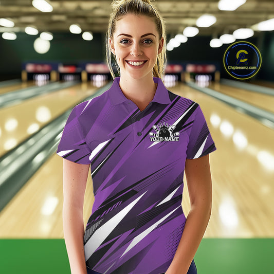 Woman wearing a purple bowling shirt with a logo and text on a bowling alley background