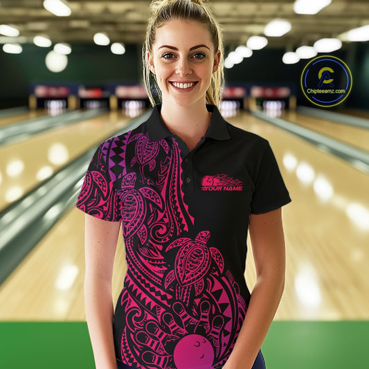 Female model wearing a black, pink, and purple bowling polo shirt at the bowling lane with Polynesian-inspired bowling graphics and tribal accents.