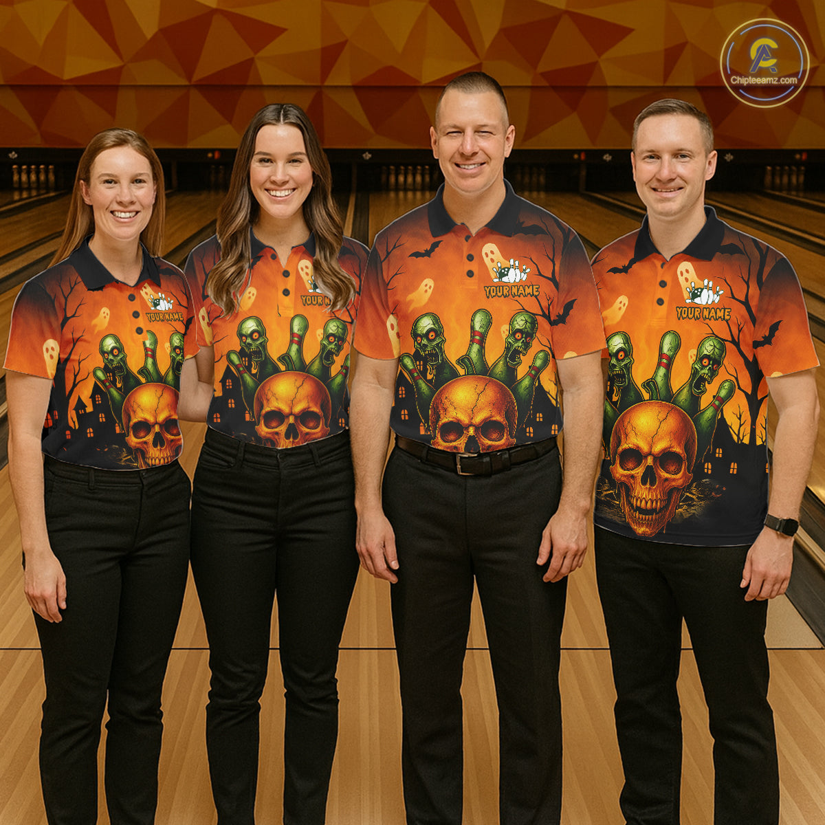 Four people standing in a bowling alley wearing matching Halloween-themed bowling shirts with a skull and zombie graphic print, paired with black pants.
