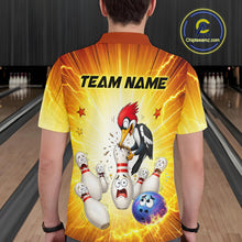 Load image into Gallery viewer, Person wearing a bowling-themed shirt with cartoon woodpecker and bowling pins in a bowling alley.