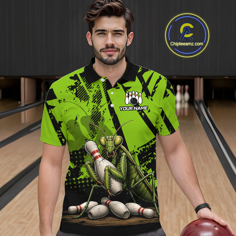 A man wearing a bright lime green and black bowling-themed graphic polo shirt with a praying mantis and bowling pins design, standing in a bowling alley. 