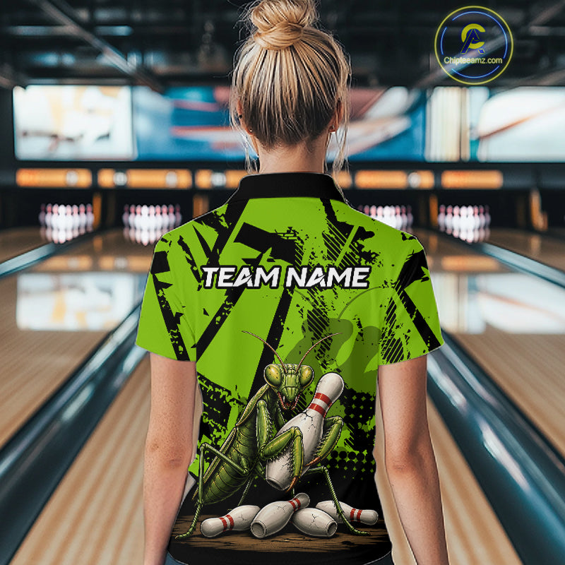 A woman viewed from behind wearing a bright lime green and black bowling-themed short-sleeve polo shirt with a praying mantis graphic and 'TEAM NAME' text, standing in a bowling alley.