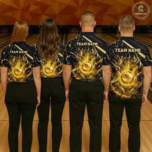 Load image into Gallery viewer, Group of four wearing custom black gold bowling shirts back view displaying personalized team names above glowing bowling ball artwork on a black gold marble crack background at the bowling alley