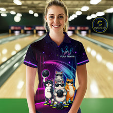 Load image into Gallery viewer, Person wearing a bowling-themed shirt with cartoon cats in a bowling alley.