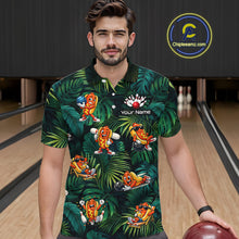 Load image into Gallery viewer, Man wearing a tropical-themed bowling shirt with a personalized name tag in a bowling alley.