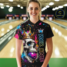 Load image into Gallery viewer, Person wearing a black shirt with colorful skull design and 'Your Name' text in a bowling alley.