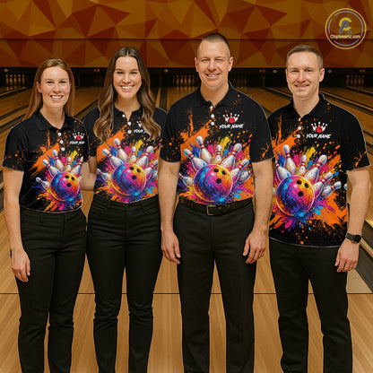 Four people standing together in a bowling alley wearing matching black polo shirts with a colorful bowling-themed graphic print on the front, paired with black pants.