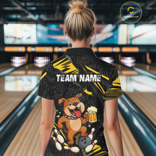 Load image into Gallery viewer, A woman wearing custom black yellow bulldog bowling quarter-zip shirt back view featuring a playful cartoon mascot, bowling ball and beer mug, displaying Your Name, at the bowling alley