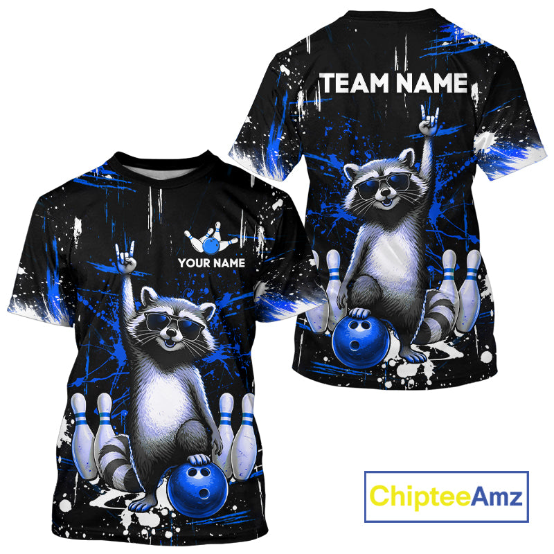 Black and blue t-shirt with raccoon design and customizable text, featuring the brand 'ChipteeAmz'.