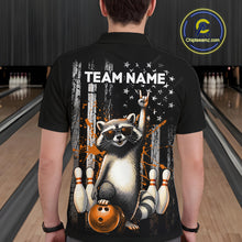 Load image into Gallery viewer, Person wearing a black shirt with a raccoon graphic and 'TEAM NAME' text in a bowling alley.
