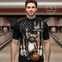 Load image into Gallery viewer, Man wearing a black shirt with a raccoon graphic and text in a bowling alley.