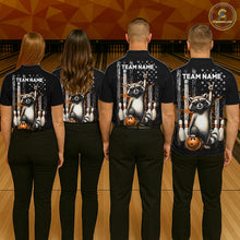 Load image into Gallery viewer, Four people wearing black shirts with raccoon graphics and 'Team Name' text on a bowling alley background.