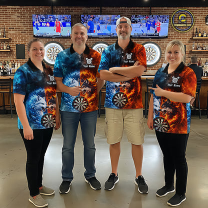 Group of four wearing matching custom fire and ice wolf dart polo shirts featuring fierce wolves, flaming dartboards, and blue icy flames in a professional dart room.
