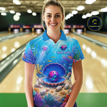 Load image into Gallery viewer, Person wearing a colorful bowling shirt with an ocean-themed design in a bowling alley.