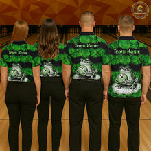 Load image into Gallery viewer, Four people standing from the back in a bowling alley, wearing matching green and black bowling shirts with a frog and bowling pin graphic on the back and customizable 'Team Name' text on the shoulders.