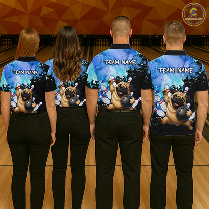 Four people standing from the back in a bowling alley, wearing matching dark blue bowling-themed short-sleeve shirts with a pug graphic and 'TEAM NAME' text, paired with black pants.