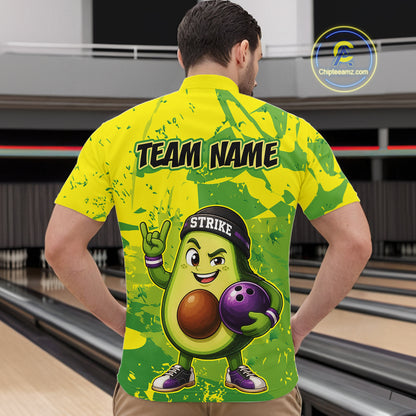 Person wearing a bright yellow and green bowling shirt with an avocado character design in a bowling alley.
