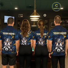Load image into Gallery viewer, A back view of a team of four pool players standing in a line in front of a blue felt pool table in a billiards room. All four are wearing the back view of the custom black billiards polo shirt, which features a a large white 'TEAM NAME' text placeholder, and a bulldog and 8-ball motif. 