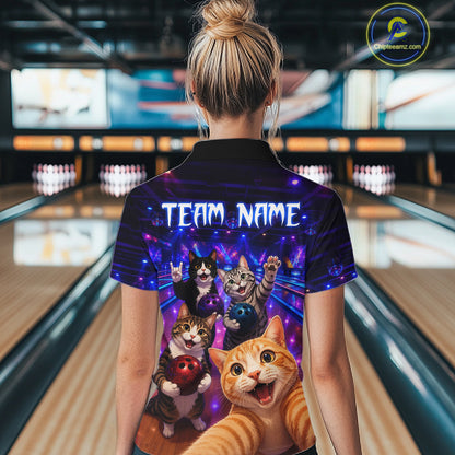 Person wearing a colorful shirt with cartoon cats in a bowling alley
