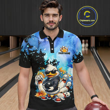 Load image into Gallery viewer, Man wearing a colorful polo shirt with a cartoon duck design in a bowling alley.