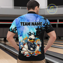Load image into Gallery viewer, Person wearing a colorful bowling shirt with a cartoon duck design in a bowling alley.