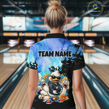 Load image into Gallery viewer, Person wearing a bowling shirt with cartoon characters and 'Team Name' text in a bowling alley.