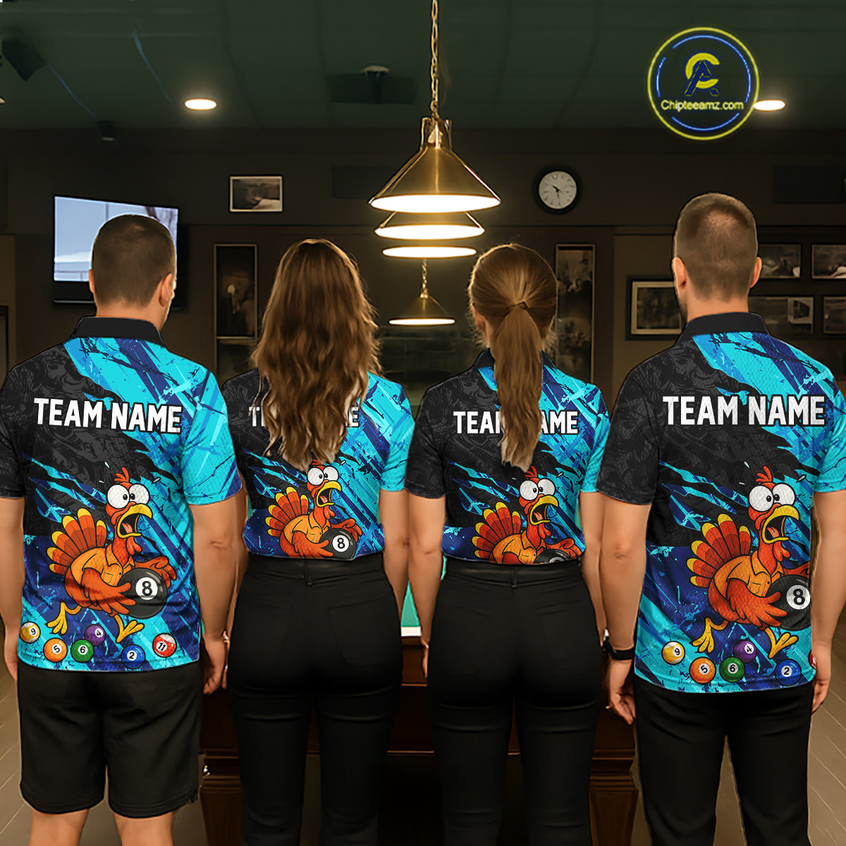 Four people standing with their backs to the camera in a dimly lit indoor room, wearing matching custom-printed athletic jerseys. The jerseys feature a vibrant cyan and black background with a large cartoon turkey graphic and the text 'TEAM NAME' and numbers on the back.
