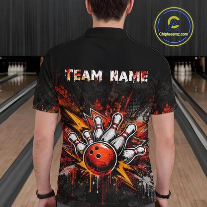 A man viewed from behind wearing a black short-sleeve bowling-themed polo shirt with a large graphic of a hand holding a red bowling ball and the text 'TEAM NAME' across the upper back. Bowling lanes are visible in the background