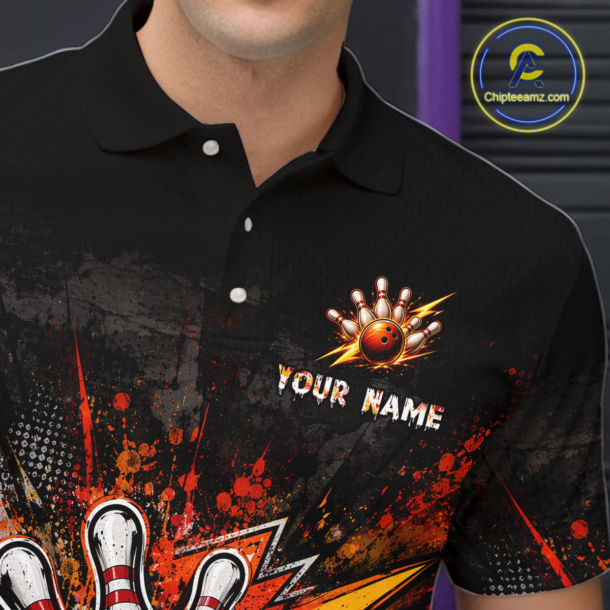 A close-up of a black short-sleeve polo shirt worn by a model, featuring a bowling-themed graphic print with pins, bowling balls, and the text 'YOUR NAME' on the chest.