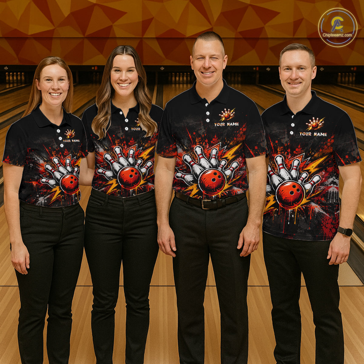 Four people standing together in a bowling alley wearing matching black short-sleeve bowling shirts with a large red, orange, and white bowling graphic on the front. The shirts have customizable text placeholders on the chest.