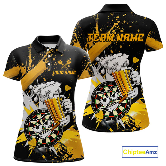 Custom short-sleeve polo shirt shown from front and back on a white background. The shirt features a black base with bold yellow paint splatters, a cartoon dartboard mascot holding a beer mug, and customizable text areas reading 'YOUR NAME' on the front chest and 'TEAM NAME'.