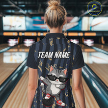 Load image into Gallery viewer, Person wearing a shirt with a cat graphic and 'TEAM NAME' text in a bowling alley.