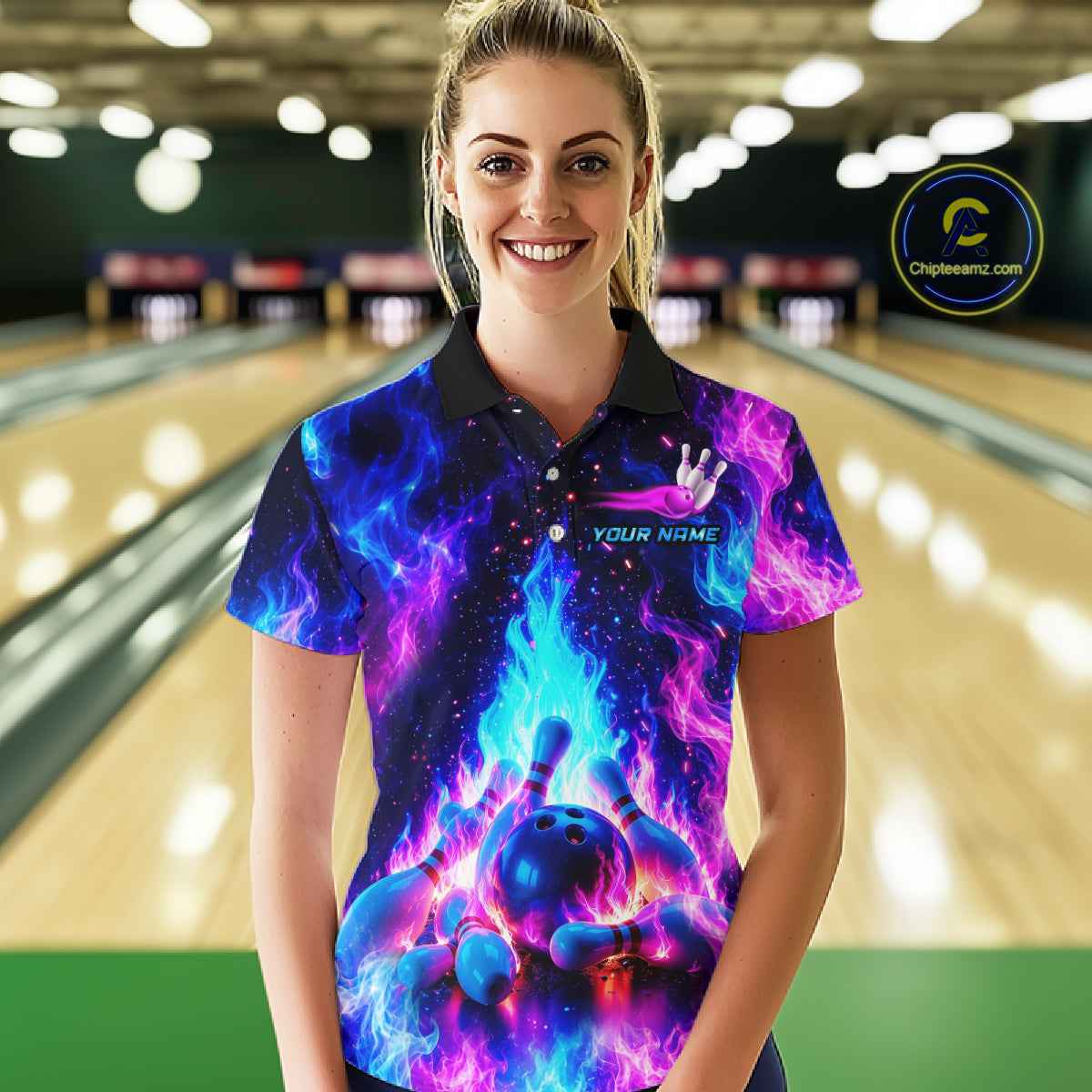 Person wearing a colorful bowling shirt with a bowling ball design in a bowling alley.
