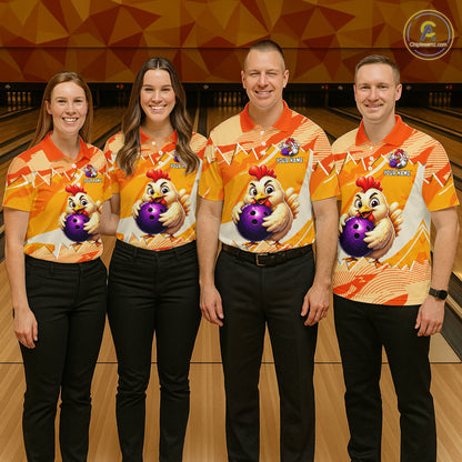 Four people wearing matching bowling shirts with a cartoon chicken design on a bowling alley.
