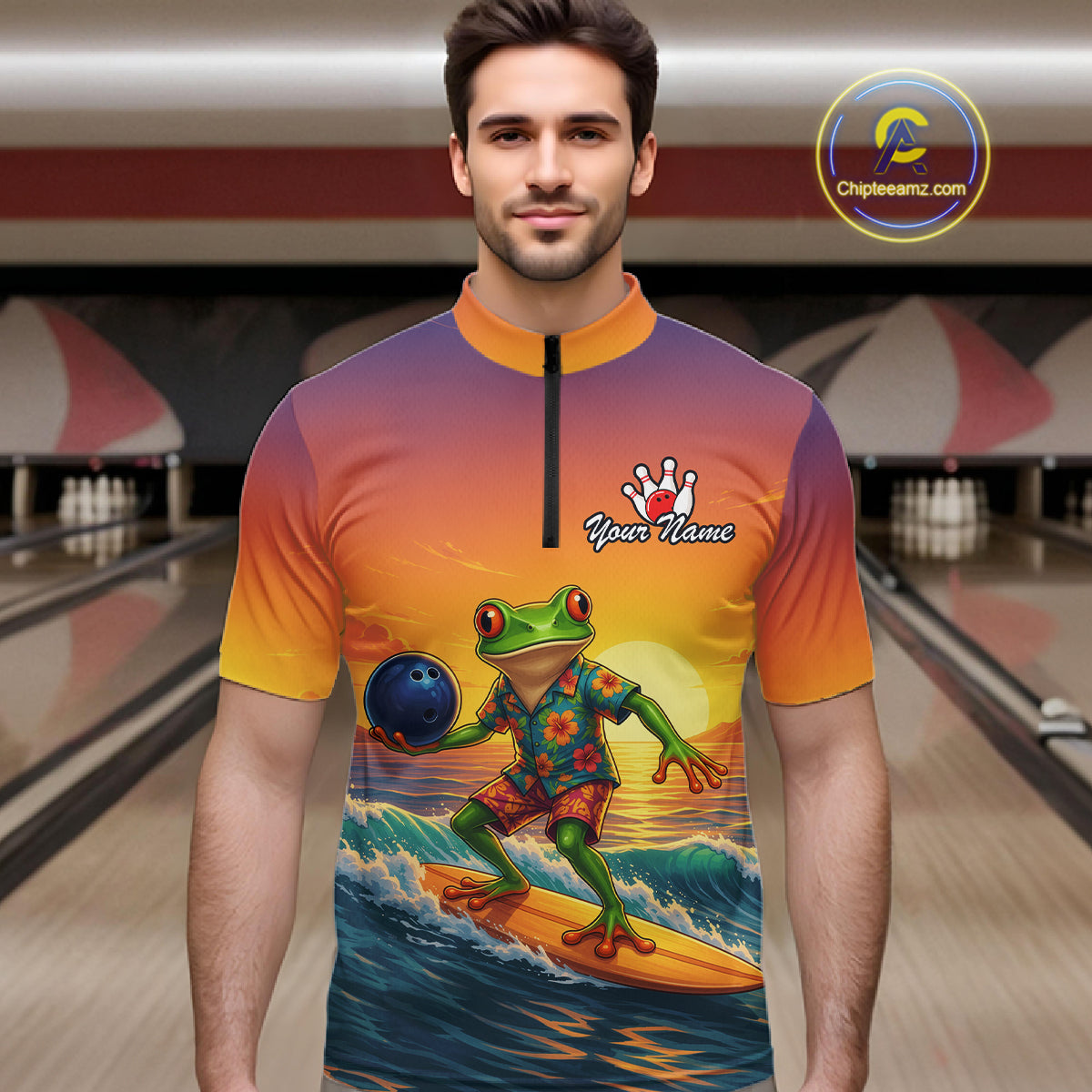 A man wearing a short-sleeve quarter-zip bowling jersey with a colorful graphic of a green frog surfing on a beach at sunset. The jersey features a purple-to-orange gradient background with a black zipper and a white 'Your Name' placeholder on the chest.