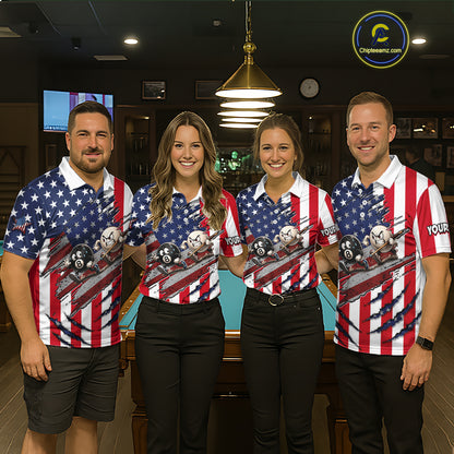 Four people standing together in a bar-like indoor setting wearing matching patriotic polo shirts with a red, white, and blue American flag design and cartoon train graphics. 