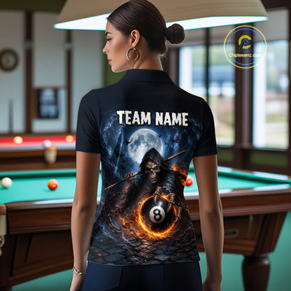 A woman stands with her back to the camera wearing a black short-sleeve polo shirt with a large graphic print on the back. The print shows a grim reaper holding a 8-ball under a full moon, with the text 'TEAM NAME' above.