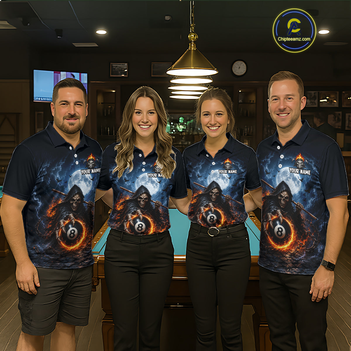 Four people standing together in a pool hall, wearing matching dark navy polo shirts with a large graphic print of a hooded figure, glowing orange flames, and an 8-ball motif. 