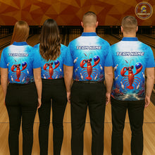 Load image into Gallery viewer, Four people wearing blue bowling shirts with lobster graphics and 'Team Name' text in a bowling alley.