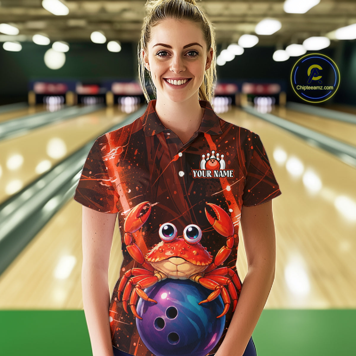 Person wearing a custom bowling shirt with a crab design in a bowling alley.