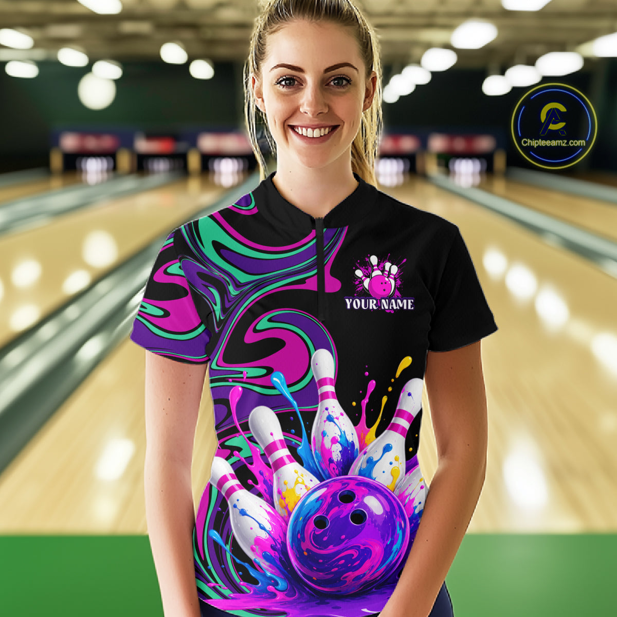 Person wearing a colorful bowling shirt with a design of a bowling ball and pins in a bowling alley.