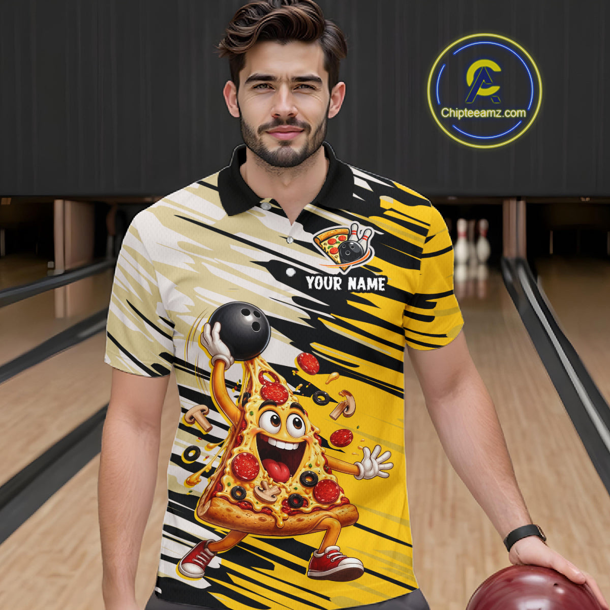 Man wearing a bowling-themed shirt with a pizza design in a bowling alley.