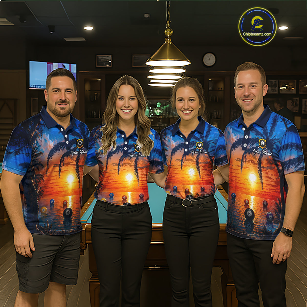 Four people wearing matching blue and orange shirts with a sunset design in a bar setting.